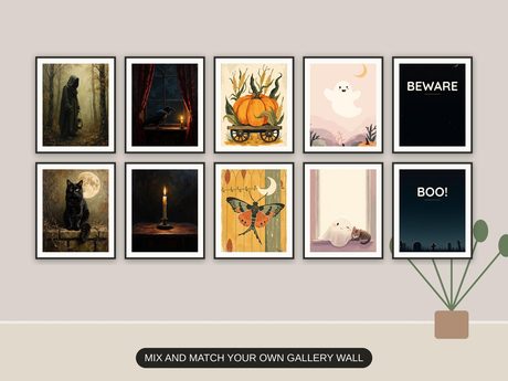 Ten Halloween prints from the bundle framed together as a gallery wall above a console table