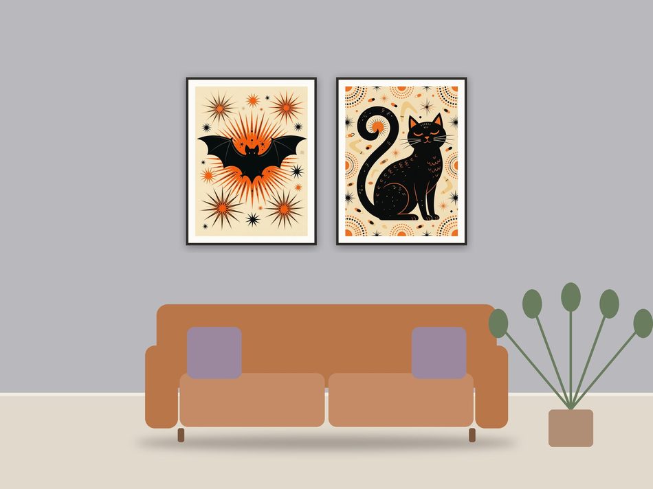 halloween decor printable art framed above a sofa in a styled living room